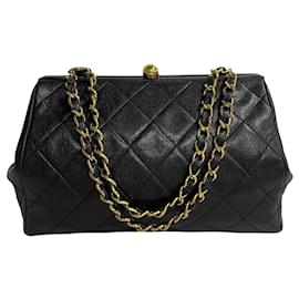 Chanel-Sac à bandoulière en cuir Chanel Matelassé 121-7 en très bon état-Noir