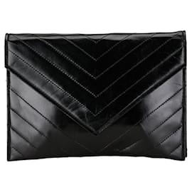 Yves Saint Laurent-Yves Saint Laurent Quilted Leather Clutch Bag in Very Good Condition-Black