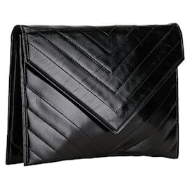 Yves Saint Laurent-Yves Saint Laurent Quilted Leather Clutch Bag in Very Good Condition-Black