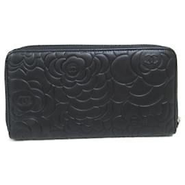 Chanel-Cartera larga de cuero Chanel Camelia redonda A50085 en excelente estado-Negro