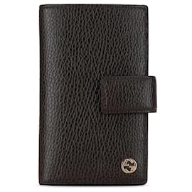 Gucci-Portefeuille long en cuir marron Gucci avec G entrelacé-Marron