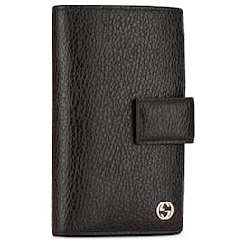 Gucci-Portefeuille long en cuir marron Gucci avec G entrelacé-Marron