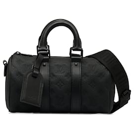 Louis Vuitton-Bolsa de ombro Keepall Bandoulière 25 em Monogram Taurillon preto da Louis Vuitton-Preto