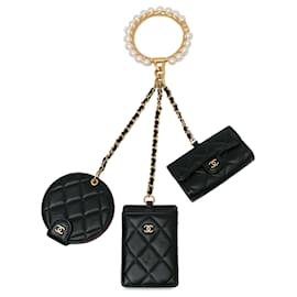 Chanel-Borsa clutch in pelle di agnello nera Chanel con corona di perle CC e più tasche-Nero