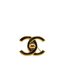 Chanel-Spilla grande placcata in oro Chanel Coco Mark Turnlock per donne-D'oro