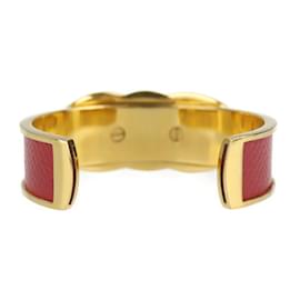 Hermès-Bracciale in pelle e metallo rosso oro con morsetto per cavallo Hermes-Rosso,D'oro