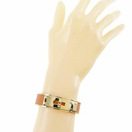 Hermès-Brazalete Hermes Kelly en oro chapado naranja-Naranja