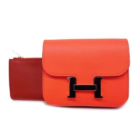 Monedero Hermès en cuero Evercalf rojo naranja Roja