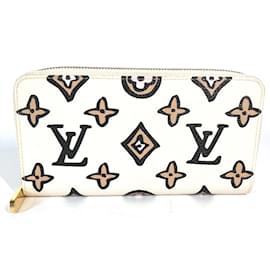 Louis Vuitton-Portefeuille long zippé Wild at Heart de Louis Vuitton-Beige