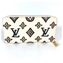 Louis Vuitton-Portefeuille long zippé Wild at Heart de Louis Vuitton-Beige