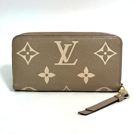 Louis Vuitton-Portefeuille long zippé bicolore Monogram Empreinte Louis Vuitton-Beige