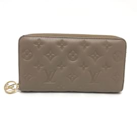 Louis Vuitton-Portefeuille long en cuir monogrammé Louis Vuitton-Beige