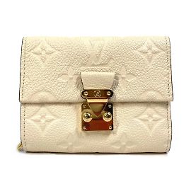 Cartera Metis Trifold Monogram Empreinte Louis Vuitton Beige