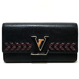 Louis Vuitton-Portafoglio bi-fold Taurillon Clemence di Louis Vuitton-Nero