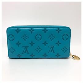 Louis Vuitton-Portafoglio lungo con zip Monogram in rilievo Louis Vuitton-Blu