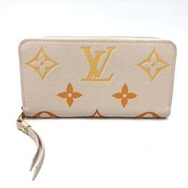 Louis Vuitton-Portafoglio lungo Monogram Empreinte Louis Vuitton-Beige