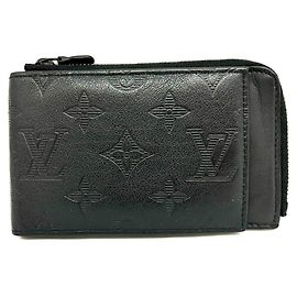 Monedero de cuero negro Monogram Shadow de Louis Vuitton Negro