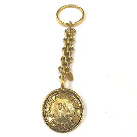Portachiavi charm vintage Chanel 31 D'oro