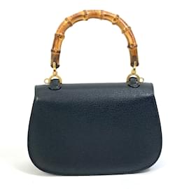 Gucci-Schwarze Lederhandtasche von Gucci-Schwarz