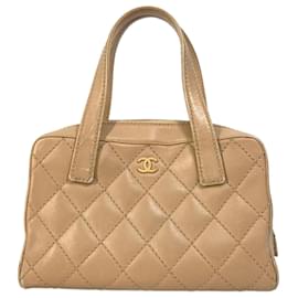 Chanel-Bolsa de viagem vintage Chanel CC Mark-Bege