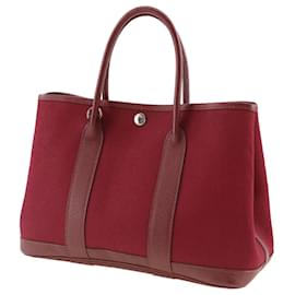 Hermès-Sac bandoulière en toile Hermes Toile Garden Party TPM en très bon état-Rouge