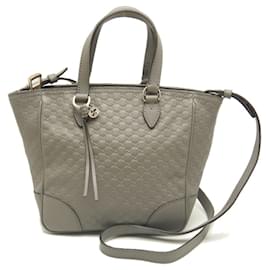 Gucci-Gucci Micro Guccissima Leather Handbag-Brown