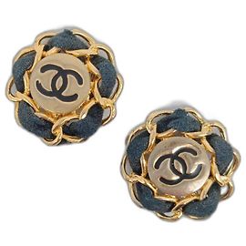 Orecchini Chanel dorati con dettagli in tessuto nero Nero D'oro