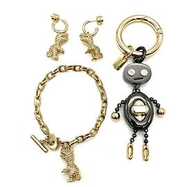 Conjunto de pulsera de charm dorado Coach Dorado