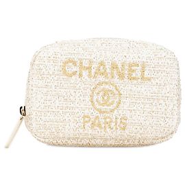 Pochette Chanel Deauville en tweed or blanc Blanc