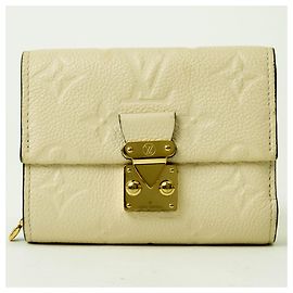 Cartera Metis Compact Bi-fold de Louis Vuitton Crudo
