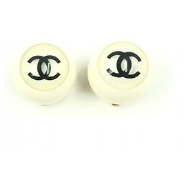 Brincos de resina com clipe Chanel Coco Mark Outro