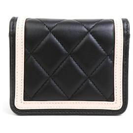 Chanel-Pochette en cuir noir et beige clair Chanel-Noir,Beige