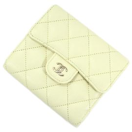 Portafoglio trifold in pelle caviar giallo limone Chanel D'oro