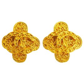 Brincos de clip em ouro vintage Chanel com flor Coco Dourado