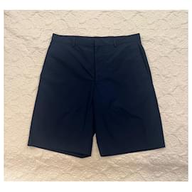 Prada-Navy blue bermuda triangle logo patch shorts-Blue