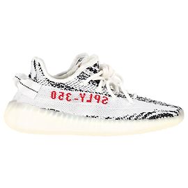Sneaker Yeezy x Adidas Boost 350 V2 Zebra in tela Primeknit bianca e nera Bianco
