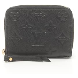 Louis Vuitton-Porte-monnaie en cuir Monogram Empreinte Louis Vuitton-Noir