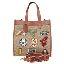 Bolsa de mão em lona com assinatura COACH Marrom Multicor