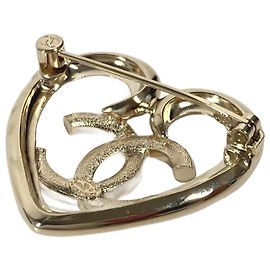 Broche en forma de corazón con strass dorado Chanel Dorado