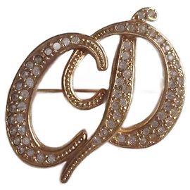 Broche Christian Dior initiales CD dorée cristal Doré