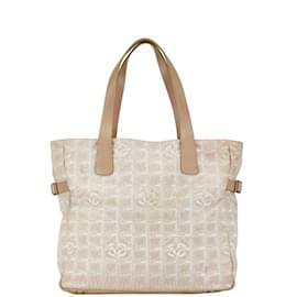 Chanel-Bolsa tote GM da nova linha de viagem Chanel-Bege