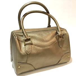 MCM-MCM Gold Leather Mini Duffle Handbag-Golden