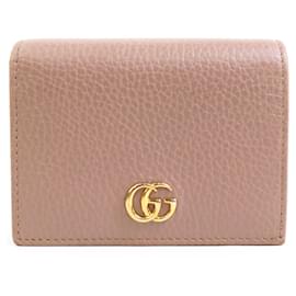 Gucci-Carteira bi-fold Gucci em couro bege-Bege