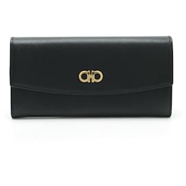 Salvatore Ferragamo-Portafoglio lungo bi-fold Double Gancini di Salvatore Ferragamo-Nero