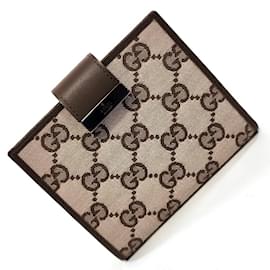 Gucci-Portafoglio bi-fold in tela GG di Gucci-Marrone,Beige