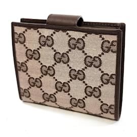 Gucci-Portafoglio bi-fold in tela GG di Gucci-Marrone,Beige