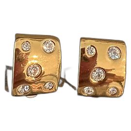 Brincos de clipe Yves Saint Laurent em metal dourado e strass Dourado