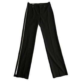 Pantalons noirs à fermeture éclair latérale Gucci par Tom Ford. Noir