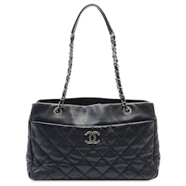 Chanel-Sac à main en cuir de veau noir Chanel Stitch It-Noir