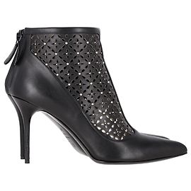 Botas de tacón alto con corte láser Alexander Mcqueen en cuero negro Negro